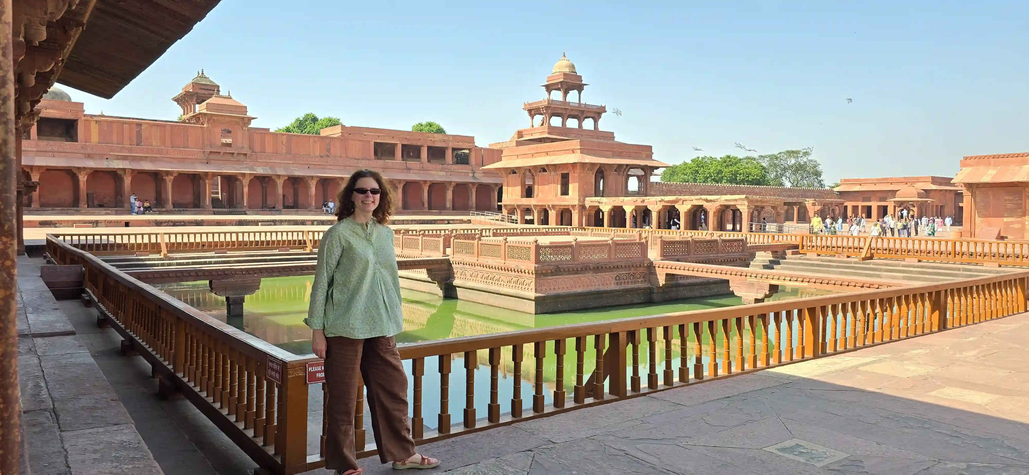 Calculator and travel itinerary notes for budgeting a Golden Triangle India tour